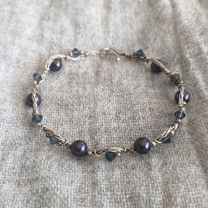Silver wire twist bracelet with blue beads